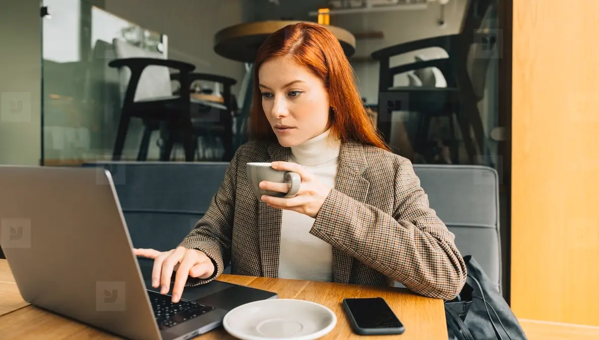 Digital nomad working in a cafe